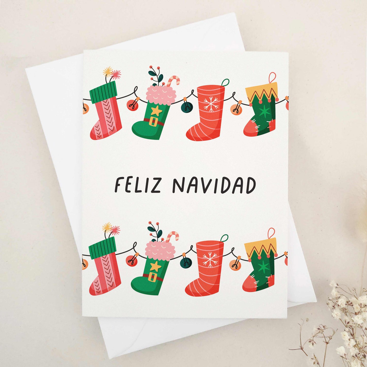 Vibrant 'Feliz Navidad' card blending festive cheer with playful charm, adorned with colorful Christmas stockings, each uniquely decorated to represent the diverse joys of the holiday season. The design captures the spirit of celebration with various patterns and colors, symbolizing the richness of holiday traditions, perfect for sharing the happiness and vibrancy of Christmas with friends and family.