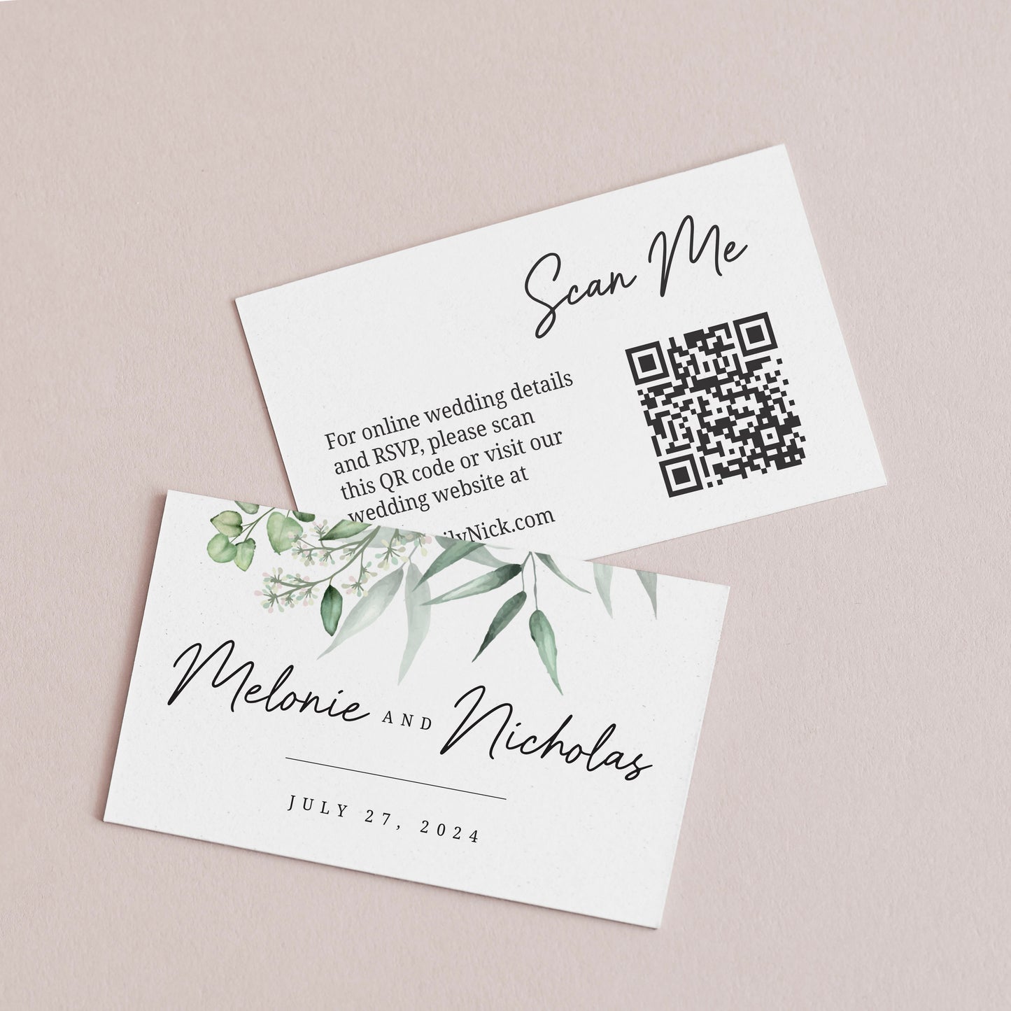 Custom wedding website cards from XOXOKristen, featuring a greenery design with elegant floral elements and a QR code for easy website access.